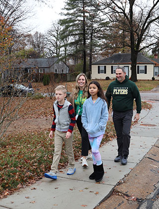  People walking on a sidewalk